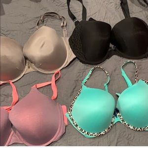 Four Victoria’s Secret bras size 36D and 36 DD